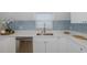 Modern kitchen featuring stainless steel appliances and sleek countertops at 3363 Poinsettia Dr, Hernando Beach, FL 34607