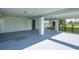 Large covered parking area under the home, providing shade and protection with easy access to the stairs at 3363 Poinsettia Dr, Hernando Beach, FL 34607