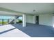 Spacious covered parking area under the home with ample room for vehicles and storage. Near the stairs to the house at 3363 Poinsettia Dr, Hernando Beach, FL 34607