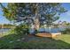 Waterfront property with canoes and kayaks, showcasing outdoor recreation and access to the canal at 3363 Poinsettia Dr, Hernando Beach, FL 34607