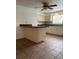 Spacious kitchen with tile flooring and a center island and neutral cabinetry at 3530 Beechwood N Ter, Pinellas Park, FL 33781