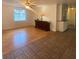 Inviting living room featuring hardwood floors, neutral walls, and ample natural light at 3530 Beechwood N Ter, Pinellas Park, FL 33781