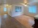 Open-concept living area with tile and hardwood flooring, great for Gathering gatherings at 3530 Beechwood N Ter, Pinellas Park, FL 33781