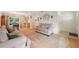 Open-concept living area with a dining space and kitchen access, ideal for entertaining at 37722 Granada Ave, Dade City, FL 33525