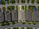 Drone shot of property highlighting the neighborhood layout and proximity to nearby community amenities at 3897 Villamore Ln, Odessa, FL 33556