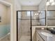 Updated bathroom features a spacious shower with modern tile design at 3897 Villamore Ln, Odessa, FL 33556