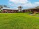 Charming marketplace featuring local produce with wooden buildings and green space at 3897 Villamore Ln, Odessa, FL 33556