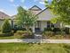 Charming single-story home with landscaped front yard and inviting entryway with attractive shrubbery at 3897 Villamore Ln, Odessa, FL 33556