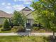 Charming single-story home with landscaped front yard and inviting entryway with attractive shrubbery at 3897 Villamore Ln, Odessa, FL 33556