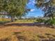 Community playground with swings and a bench, creating a fun space for outdoor recreation at 3897 Villamore Ln, Odessa, FL 33556