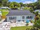 Aerial view of a home, back patio, and well maintained lawn at 4007 S Renellie Dr, Tampa, FL 33611
