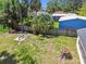 Enjoy the spacious backyard with partial fencing, mature trees, and lots of green space at 4007 S Renellie Dr, Tampa, FL 33611