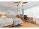 Cozy bedroom features wood floors, natural light and modern decor at 4007 S Renellie Dr, Tampa, FL 33611