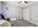 Bedroom featuring light grey walls, hardwood floors, and double door closet at 4007 S Renellie Dr, Tampa, FL 33611