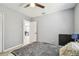 Bedroom featuring a ceiling fan, white trim, wood-look flooring, and closet at 4007 S Renellie Dr, Tampa, FL 33611