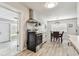 Bright dining area with direct access to kitchen, with stainless oven, and stylish lighting at 4007 S Renellie Dr, Tampa, FL 33611