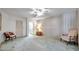 Spacious bedroom with ensuite bathroom, ceiling fan, and ample closet space at 4646 Lacrosse Ct, New Port Richey, FL 34655