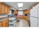 Commercial kitchen with stainless steel appliances and ample countertop space at 4646 Lacrosse Ct, New Port Richey, FL 34655