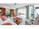 Bright living room with sliding glass doors leading to the lanai at 4646 Lacrosse Ct, New Port Richey, FL 34655