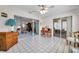 A sun room with tile flooring and sliding glass doors leading to other rooms and the backyard at 4646 Lacrosse Ct, New Port Richey, FL 34655