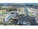 Aerial view of a waterfront condo with marina, close to Gulf Harbor Private Beach, offering desirable coastal living at 4939 Floramar Ter # 203, New Port Richey, FL 34652