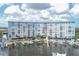 Waterfront condo building with boat docks, ideal for boating enthusiasts and enjoying waterfront living at 4939 Floramar Ter # 203, New Port Richey, FL 34652