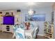 Bright dining room with stylish decor and modern lighting fixtures, perfect for entertaining at 4939 Floramar Ter # 203, New Port Richey, FL 34652