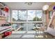 Bright room with panoramic view of a boat dock and waterways under a cloudy sky at 4939 Floramar Ter # 203, New Port Richey, FL 34652