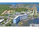 Aerial view of condo building on the water with marina access at 4939 Floramar Ter # 812, New Port Richey, FL 34652