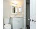 Bathroom with a modern vanity, mirror, and fixtures, creating a clean and inviting space at 4939 Floramar Ter # 812, New Port Richey, FL 34652