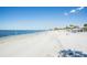 Scenic beach with clear water and a sandy shoreline, perfect for walking or relaxing at 4939 Floramar Ter # 812, New Port Richey, FL 34652