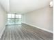Bright living space with ample natural light and neutral tones, offering a serene living environment at 4939 Floramar Ter # 812, New Port Richey, FL 34652