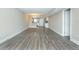 Open-concept living space with an adjacent kitchen offering a seamless transition and versatile living at 4939 Floramar Ter # 812, New Port Richey, FL 34652
