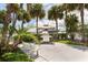 Community outdoor grill and seating area at 4939 Floramar Ter # 812, New Port Richey, FL 34652