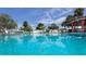 Beautiful and refreshing community swimming pool perfect for cooling off on a hot summer day at 4939 Floramar Ter # 812, New Port Richey, FL 34652