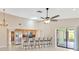 Contemporary kitchen featuring stainless appliances, breakfast bar and open layout at 5021 Bridgeport Dr, Safety Harbor, FL 34695