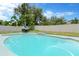 A private pool awaits, complete with an outdoor dining set for al fresco meals at 5021 Bridgeport Dr, Safety Harbor, FL 34695