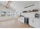 Well-appointed bar area featuring custom cabinetry, wine storage, and views of the water at 5348 Lawrence Ln, New Port Richey, FL 34652