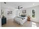 Serene bedroom with a neutral palette, featuring plenty of natural light and ceiling fan at 5348 Lawrence Ln, New Port Richey, FL 34652