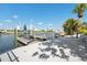 Waterfront view from the dock, offering a scenic view of the canal and neighborhood homes at 5348 Lawrence Ln, New Port Richey, FL 34652