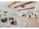 Open concept living room with an open bar area, vaulted ceilings and lots of light at 5348 Lawrence Ln, New Port Richey, FL 34652