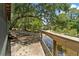 Property featuring a spacious deck overlooking a scenic view of the river at 6410 Amelia Ln, Dade City, FL 33523