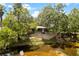 Charming home with a beautiful porch and views of the tranquil river at 6410 Amelia Ln, Dade City, FL 33523
