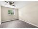 Clean bedroom with luxury vinyl plank flooring and a window to provide natural light at 6509 Pine Meadows Dr, Spring Hill, FL 34606