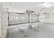 Spacious garage with plenty of room for storage and a two-car garage door at 6545 North Lake Dr, Zephyrhills, FL 33542