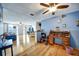 Open living area showcasing hardwood floors, multiple living spaces, and natural light at 7118 Cherry Laurel Dr, Port Richey, FL 34668