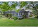 Backyard showing the house and pool and surrounding vegetation at 7268 Crystal Spring Run, Weeki Wachee, FL 34607