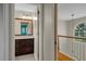 Upstairs bathroom with cabinets and granite countertop at 7268 Crystal Spring Run, Weeki Wachee, FL 34607