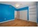 Bedroom has wood floors and a closet with a built-in bookshelf at 7268 Crystal Spring Run, Weeki Wachee, FL 34607