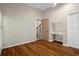 Bedroom featuring hardwood floors, closet space and a built-in desk area at 7268 Crystal Spring Run, Weeki Wachee, FL 34607